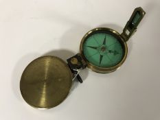 A 19th century brass compass signed James J.