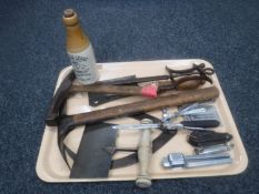 A tray of vintage ice packs, meat cleaver and sharpener, brick hammer, toffee hammer, nut cracker,
