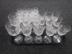 A tray containing assorted lead crystal drinking glasses