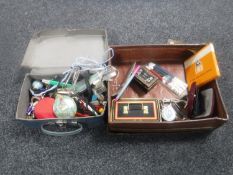 A vintage leather case containing a cash box of various coins, cufflinks, pens, pen knives,