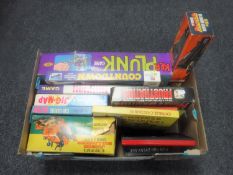 A box of vintage board games, Junior bull dozer, boxed Corgi rocket super booster no.