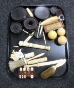A collection of antique ivory items including billiard ball, parasol handle,