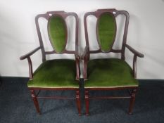 A pair of late 20th century mahogany armchairs in green dralon