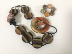 A small collection of agate jewellery to include cuff bracelet and brooch