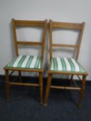 A pair of satin walnut bedroom chairs