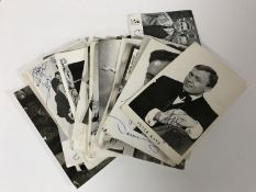 A collection of autographed monochrome photographs of past celebrities/musicians; Barry Noble,