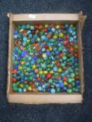 A box of vintage glass marbles