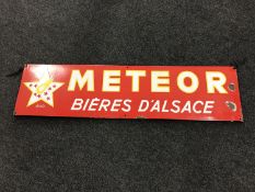 A vintage French enamelled sign "Meteor,