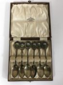 A set of six silver and enamelled teaspoons, inscribed S. Sgt. R. Henderson, R.A.M.C.