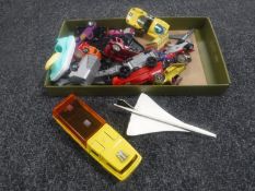 A box containing a small quantity of play-worn die cast vehicles including Matchbox Super Kings