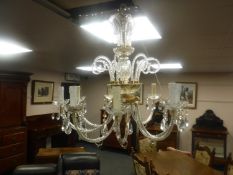 A highly-ornate crystal three tier chandelier, diameter, 85cm,