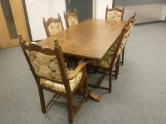 A good quality oak refectory dining room table and six chairs,