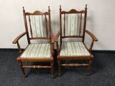 A pair of armchairs in Regency stripped fabric