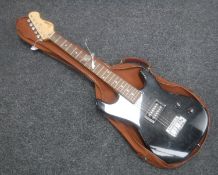 A Encore electric guitar in carry bag