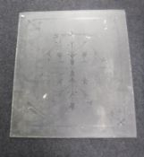 An antique etched glass window panel CONDITION REPORT: 90cm by 101cm.
