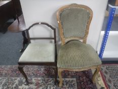 A mahogany dressing table stool and continental style dining chair