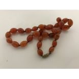 An amber type bead necklace