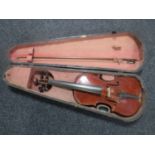 A German made copy of a Stradivarius violin and bow in case