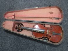 A German made copy of a Stradivarius violin and bow in case