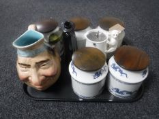 A tray of five Ellgrave wooden lidded storage jars, large Sarreguemines pottery jug,