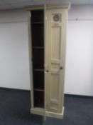 An Edwardian painted oak double door changing room locker