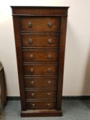 A good quality mahogany gun cabinet in the form of a Wellington chest, with key,