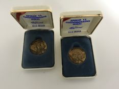 Two cased bronze Apollo 11 commemorative medals by Hayward