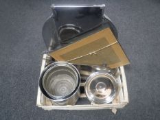 A crate of stainless steel bread bin, plated twin handled tray,