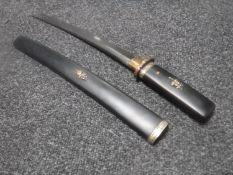 A 20th century Japanese tanto dagger in scabbard
