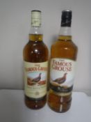 Two bottles of Famous Grouse whisky