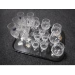 A tray of seventeen lead crystal and glass drinking glasses - six Stewart Crystal brandy glasses,