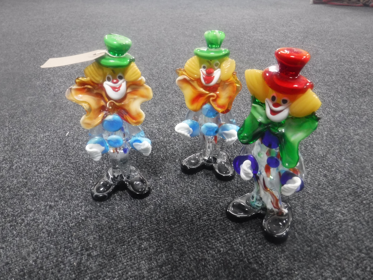 Three Murano glass clowns