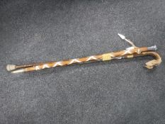 A military stick with silver pommel and two antique walking sticks