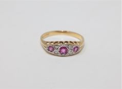 An 18ct gold ruby and diamond ring,