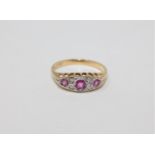 An 18ct gold ruby and diamond ring,