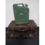 Two vintage leather luggage cases and a Jerry can