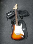 A Star Sound electric guitar in carry bag with mini amplifier
