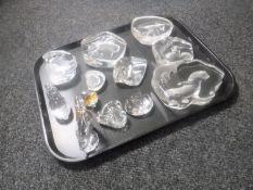 A tray of eleven glass paperweights of animals and a crystal ornament