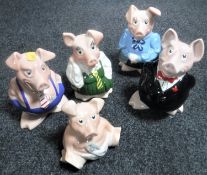 A set of five Wade Natwest pigs with stoppers