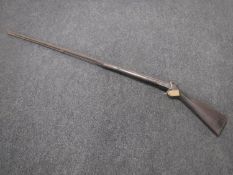 A 19th century percussion cap long-barrelled musket CONDITION REPORT: No apparent
