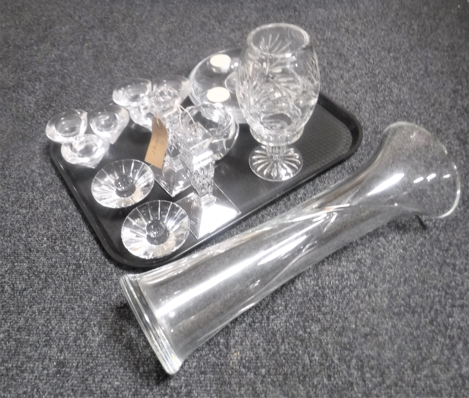 A tray of assorted glass ware and crystal - Stewart Crystal candlesticks,