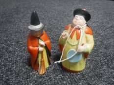 Two Royal Worcester candle snuffers