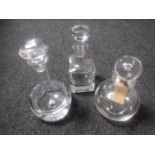 Three contemporary glass decanters