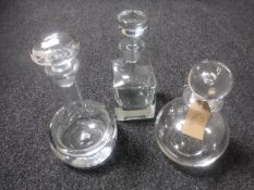 Three contemporary glass decanters