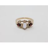 A 9ct gold opal and garnet ring,