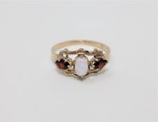 A 9ct gold opal and garnet ring,