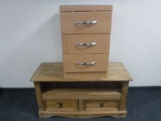 A pine entertainment stand fitted two drawers and a bedside chest