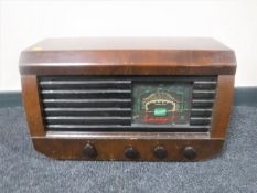 A vintage walnut cased Portdyme valve radio