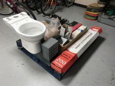 A pallet of toilet with cistern, miniature metal ten drawer chest, welder, bulk head lights,