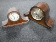 An antique mahogany cased mantel clock and an oak cased mantel clock with silvered dial